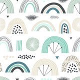 Seamless pattern with abstract rainbows. Vector cute print in pastel colors.