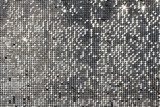 Silver background mosaic with light spots and stars