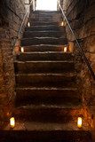 Spooky stone stairs in old castle 