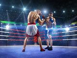 Two professionl boxers are fighting on arena 