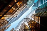 Upwards perspective of glass commercial skyscrapers, Hong Kong
