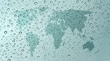 world map on glass with water drops 