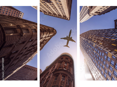 plane over highrise buildings - Dreiteiliges Leinwandbild, Triptychon