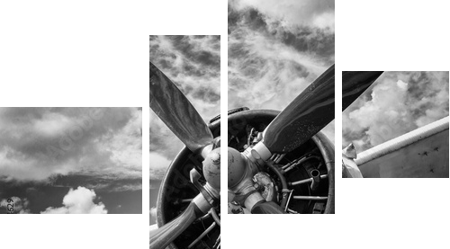 Close up of old airplane in black and white - Vierteiliges Leinwandbild, Viertychon