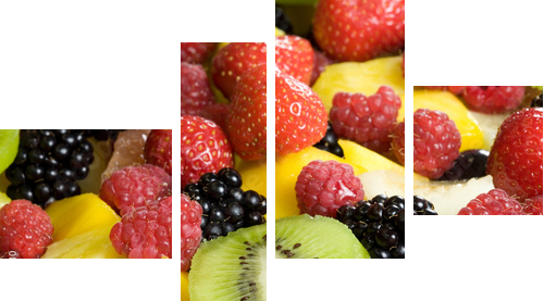 Delicious fruit salad served in a bowl - Vierteiliges Leinwandbild, Viertychon