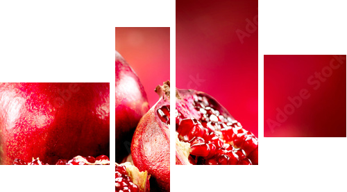 Pomegranates over Red Background. Organic Bio fruits - Vierteiliges Leinwandbild, Viertychon
