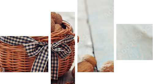 Walnuts in wicker basket  - Vierteiliges Leinwandbild, Viertychon