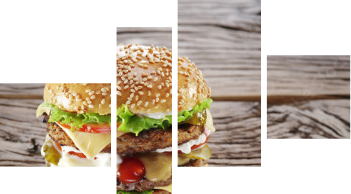 Hamburger on old wooden table.  - Vierteiliges Leinwandbild, Viertychon