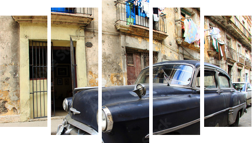 A classic old car is black color parked in front of the building - Fünfteiliges Leinwandbild, Pentaptychon